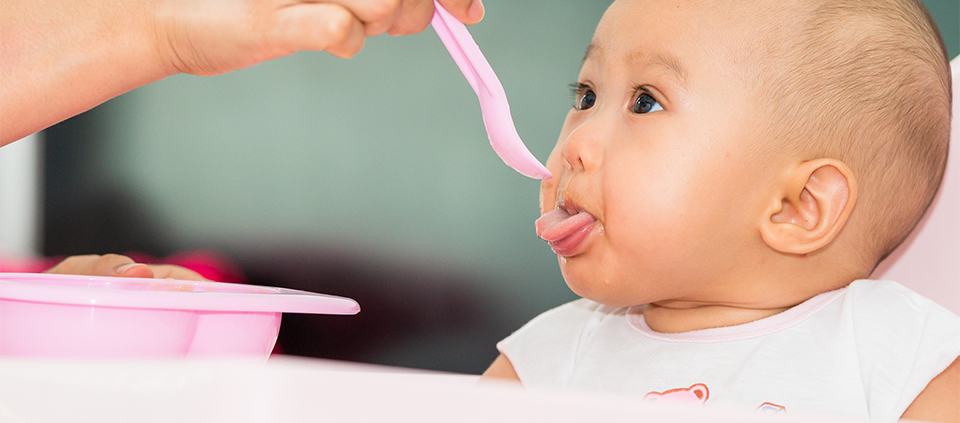 Baby Being Fed with Spoon