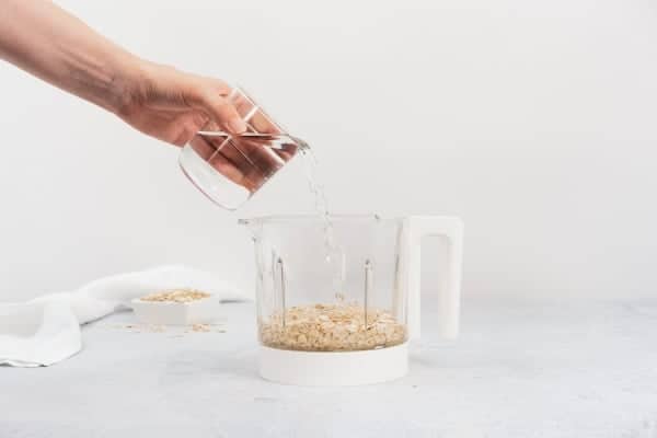 pouring water into babycook bowl