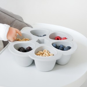 Beaba multiportions in cloud, baby reaching fruits and cereal in portions