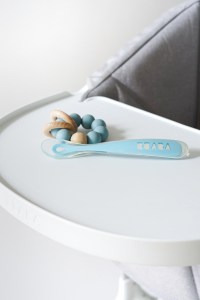 Beaba first foods spoon on high chair tray