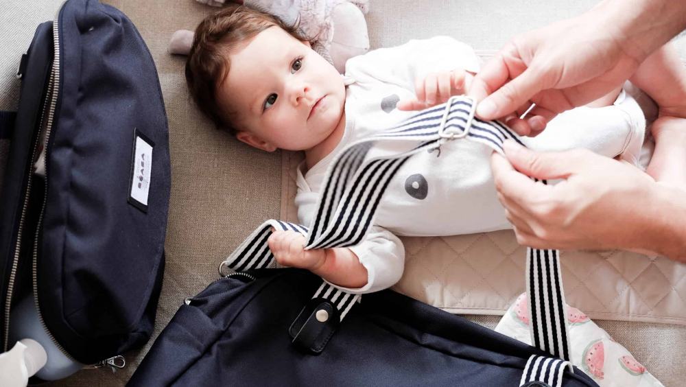 Baby next to Beaba must have modern diaper bag