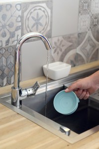 Beaba Glass Suction Silicone Piece Being Washed In Sink