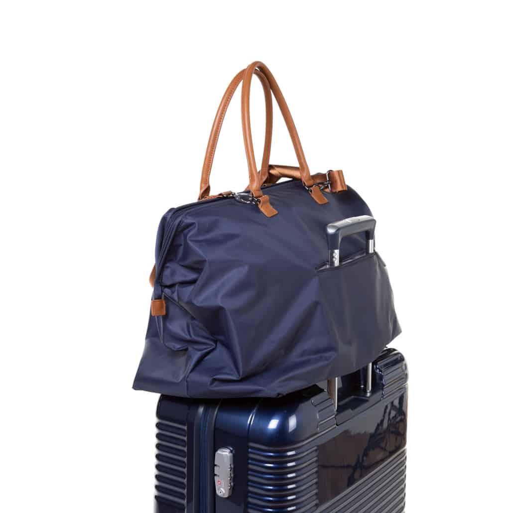 Childhome Mommy Bag Navy on suitcase