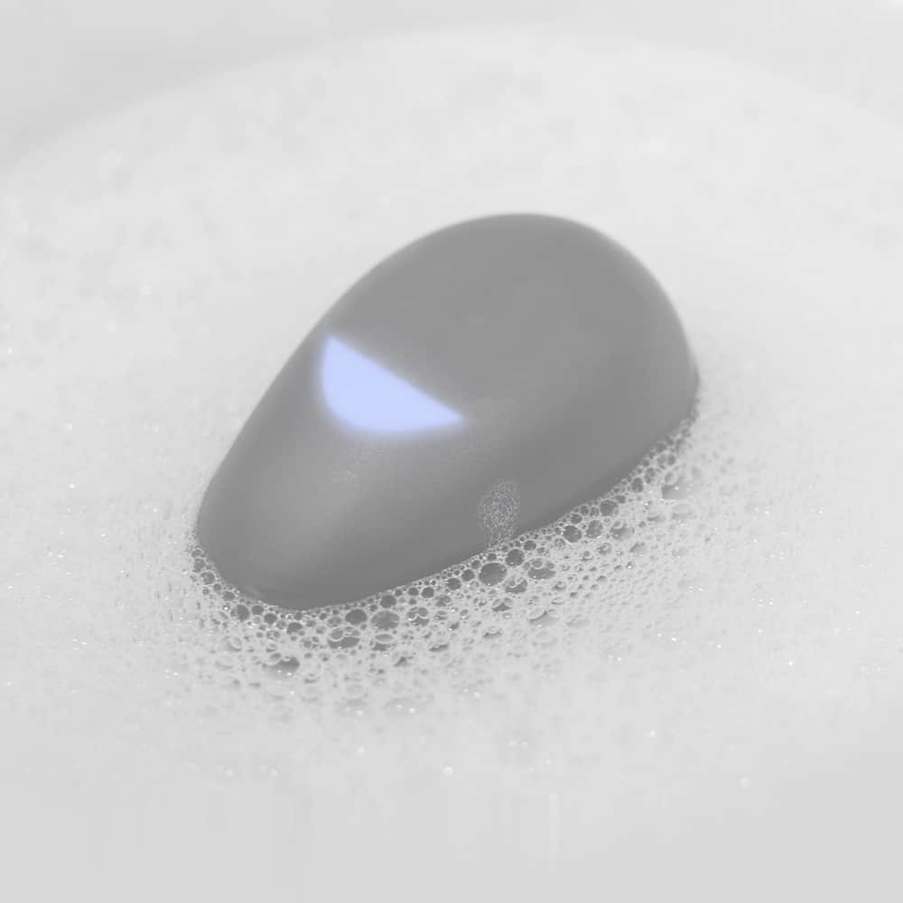 Pebbly glowing blue in water
