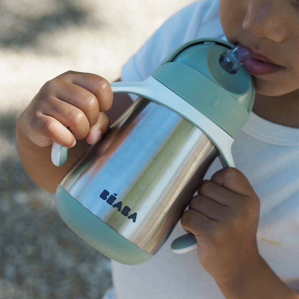 Child drinking from Beaba Stainless Steel Straw Cup