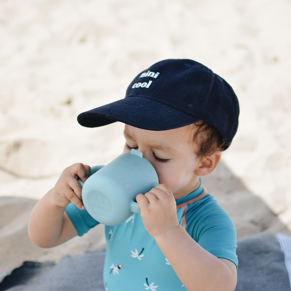 Child drinking from Beaba Silicone Training Cup