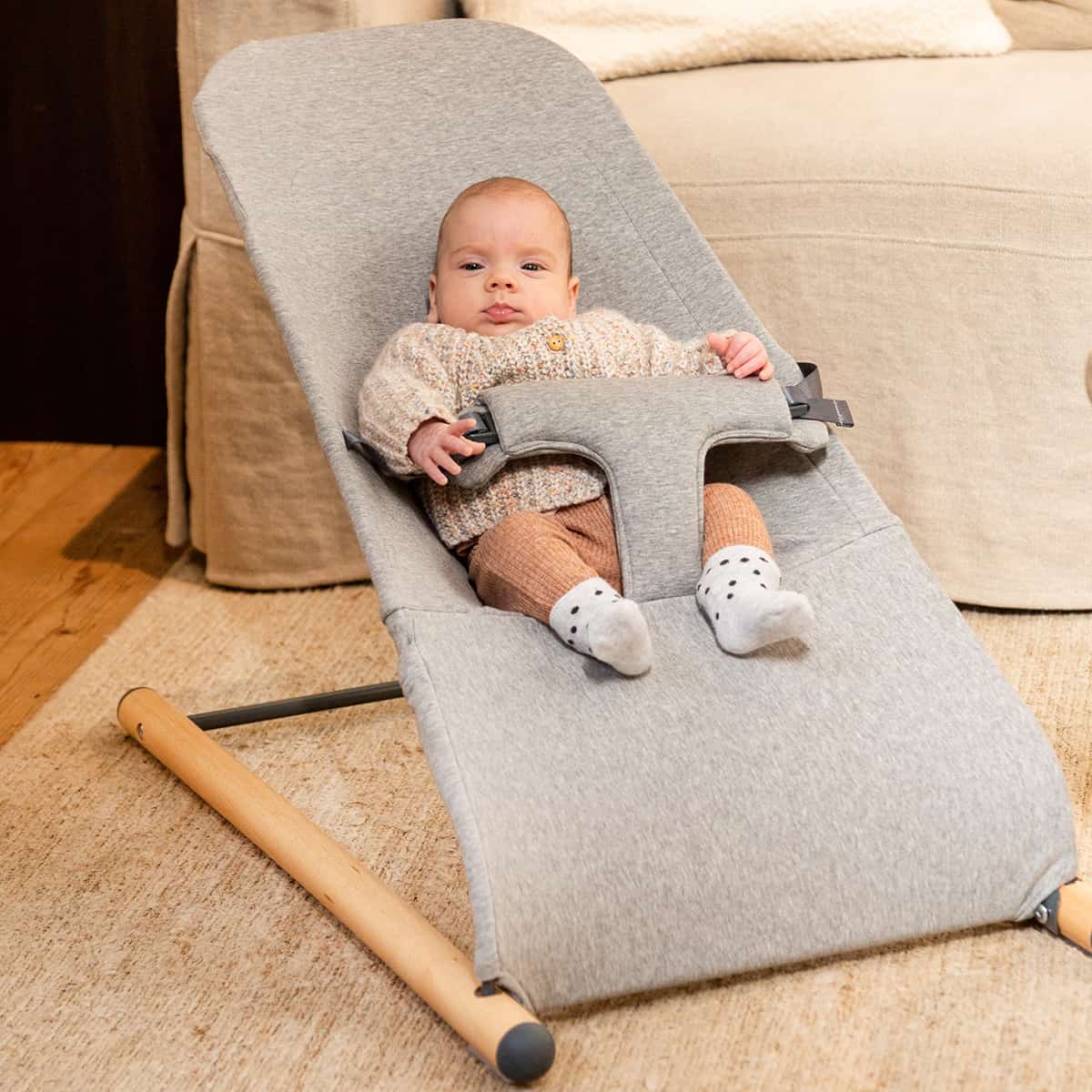 Childhome Bouncer Jersey Grey in Living Room with Baby