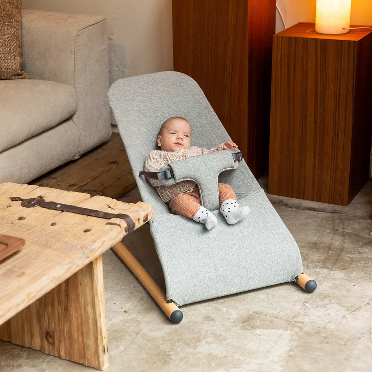 Childhome Bouncer Jersey Grey in Living Room With Baby