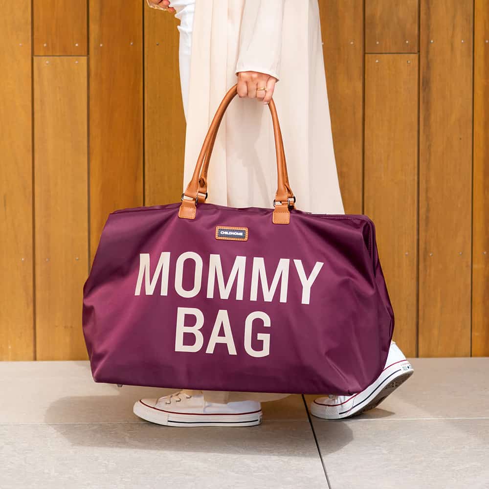Mom Walking With Childhome Mommy Bag Aubergine Front