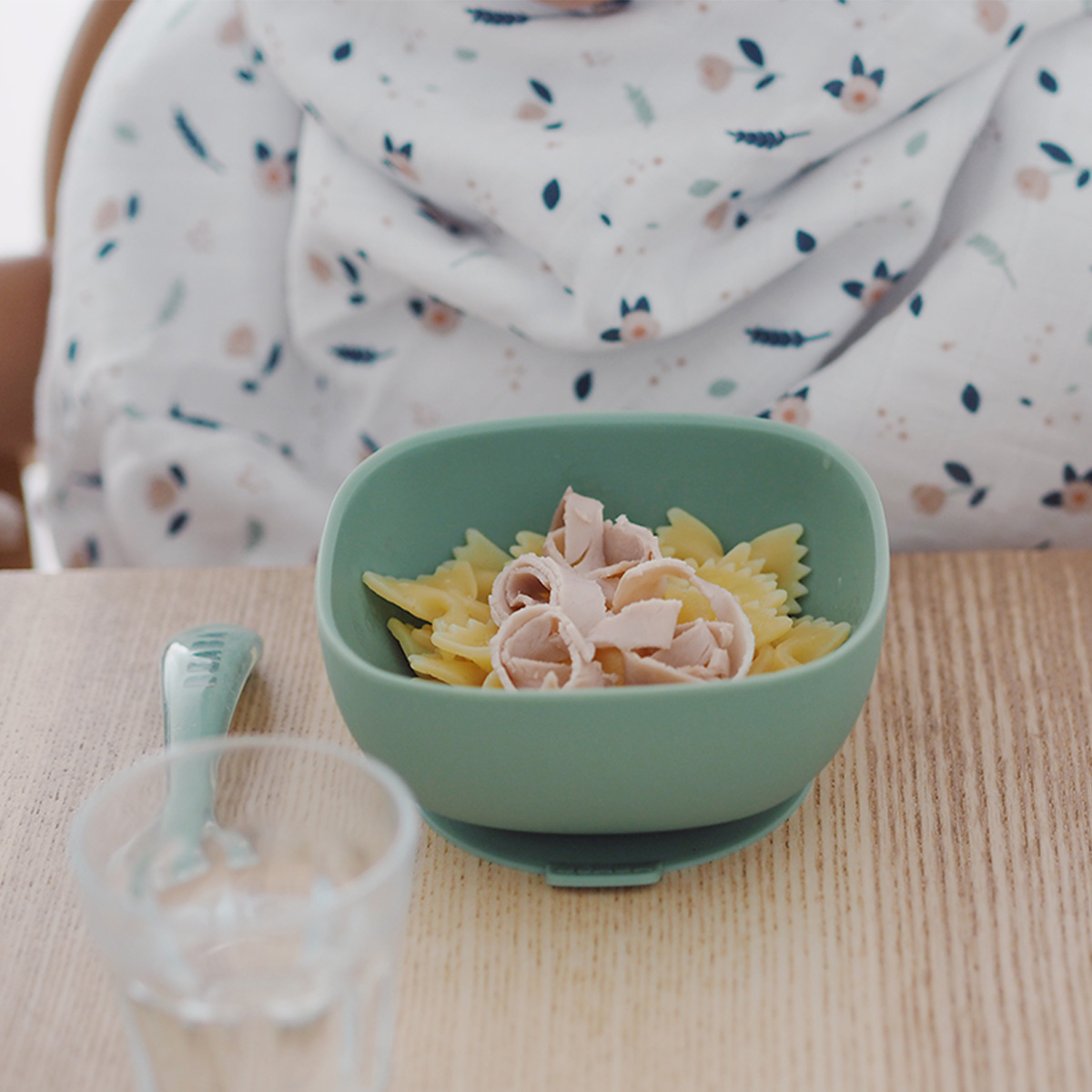silicone suction bowl sage on table with pasta
